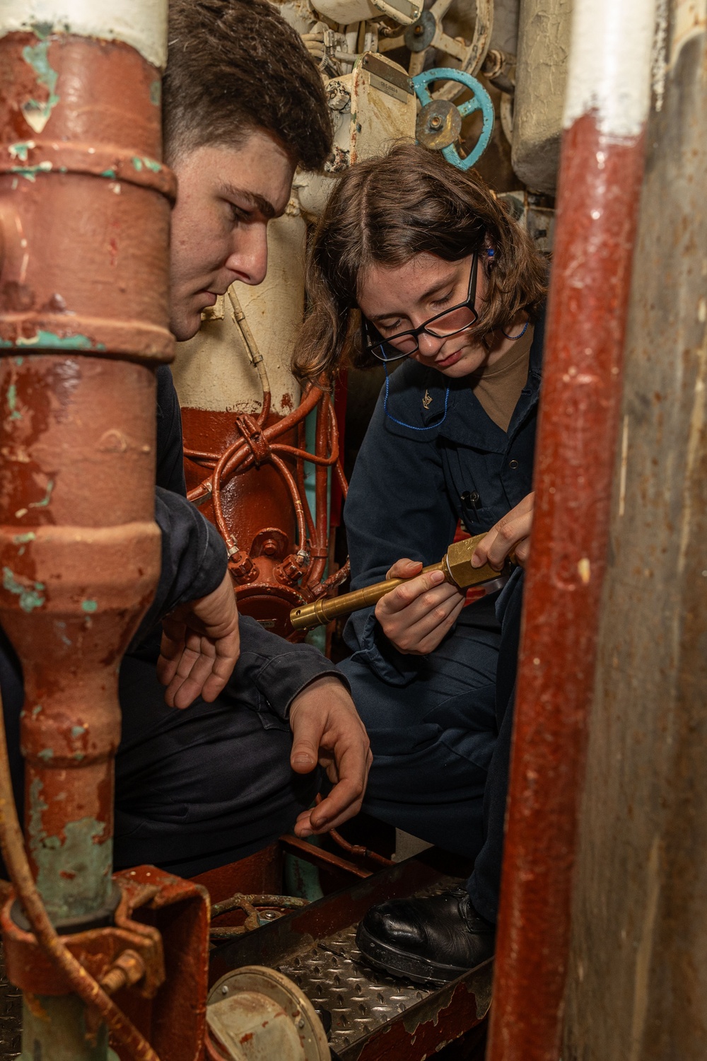 USS Iwo Jima Sailors Inspect A Salinity Cell