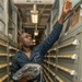 USS Iwo Jima Sailors Audits A Supply Room