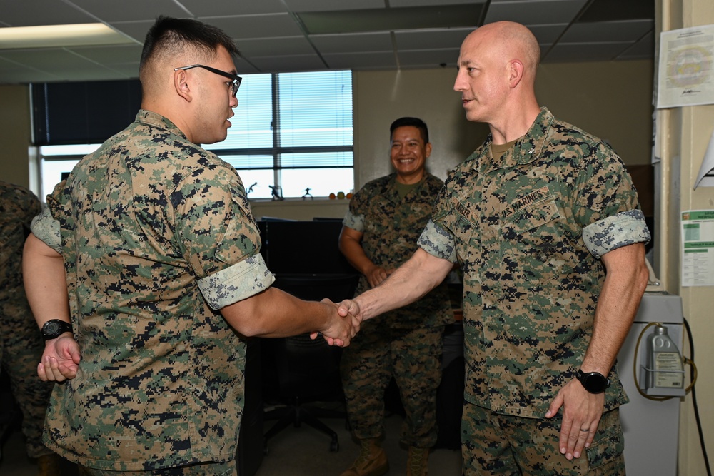 U.S. Marines With Regional Disbursing Office-Pacific Awarded Coins From III MEF