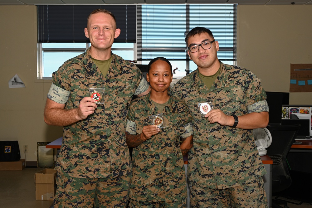 U.S. Marines With Regional Disbursing Office-Pacific Awarded Coins From III MEF