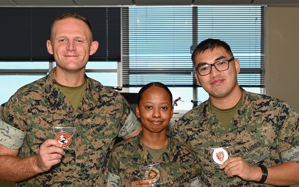 U.S. Marines With Regional Disbursing Office-Pacific Awarded Coins From III MEF