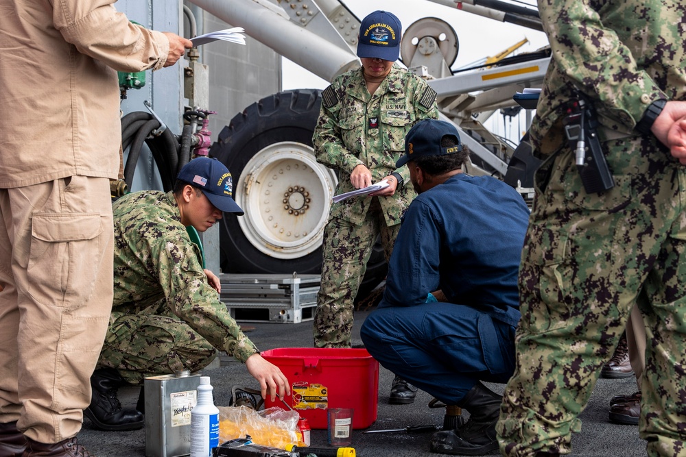 Abraham Lincoln conducts routine operations