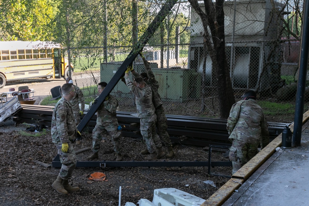 National Guardsmen clear out buildings for Capital Guardian Youth ChalleNGe Academy