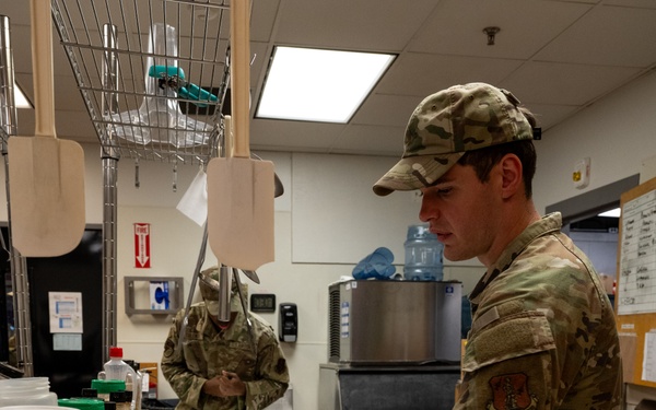 181st Force Support Squadron prepare and serve meals in DFAC