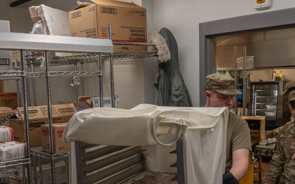 181st Force Support Squadron prepare and serve meals in DFAC
