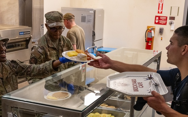 181st Force Support Squadron prepare and serve meals in DFAC