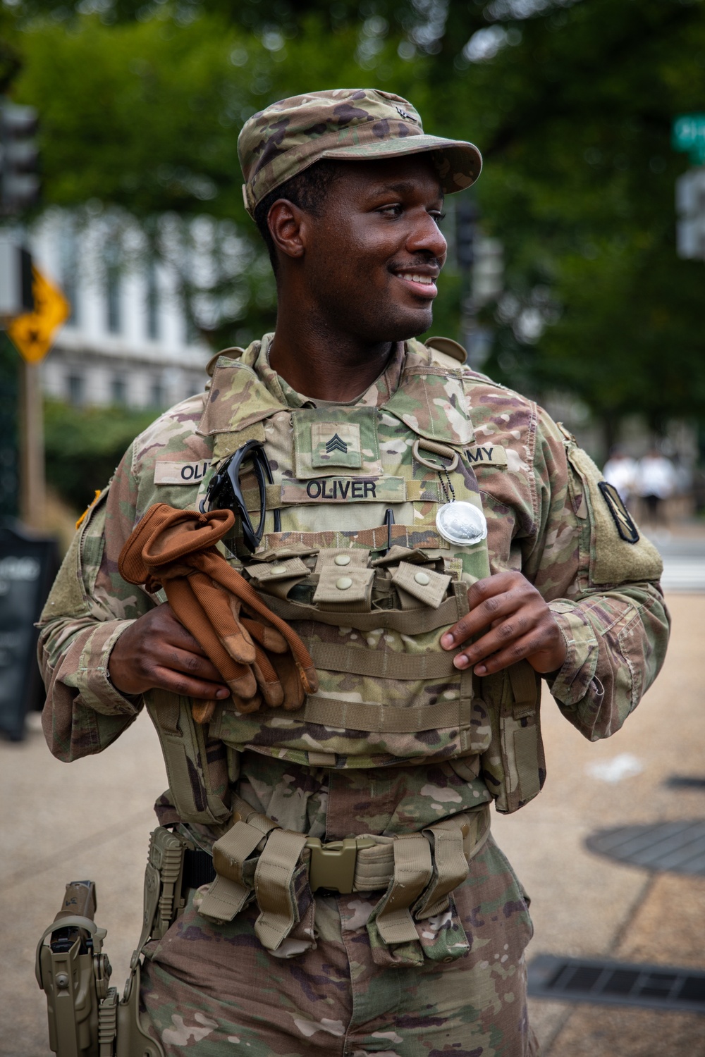 A Mississippi National Guard Soldier smiles while receiving food in Washington, D.C