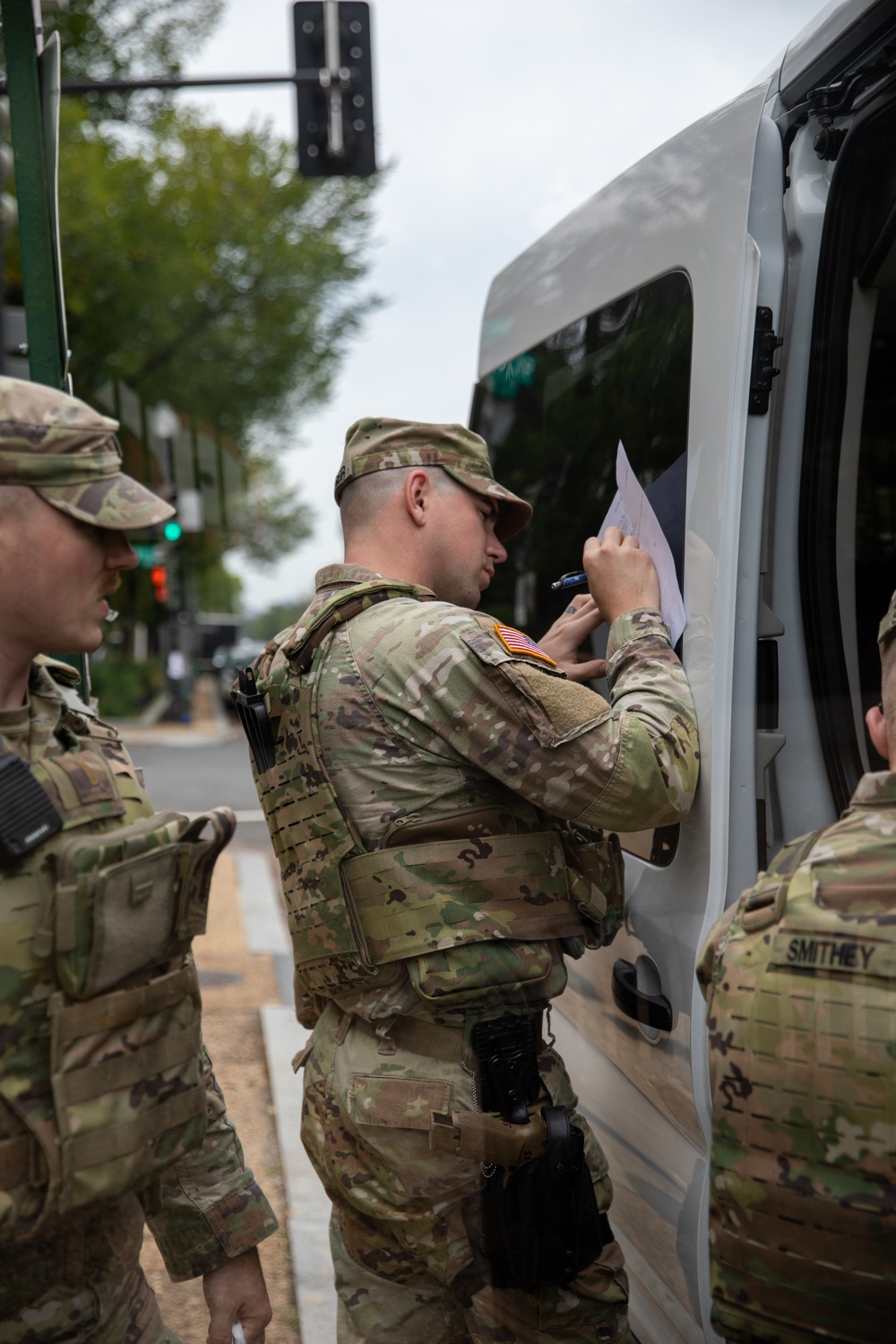 A Mississippi National Guard Soldier signs meal distribution paperwork