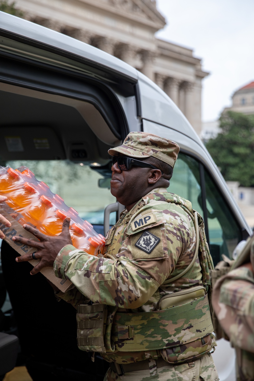 A Mississippi National Guard Soldier receives Gatorade while on patrol in Washington, D.C.