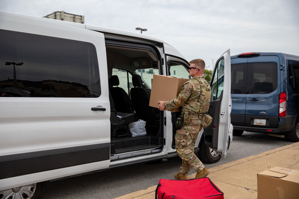A Mississippi National Guard Soldier loads food for troops on patrol in Washington, D.C.
