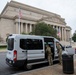 Mississippi National Guard Soldiers deliver food in front of the National Archives Building
