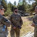 Canadian Forces and U.S. Army military police forces talk about detainee operations in Latvia