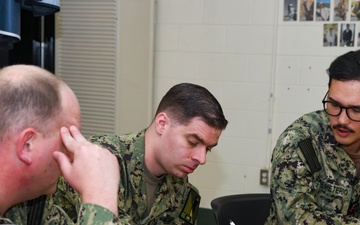 Sailors hold professional military education workshop