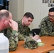 Sailors hold professional military education workshop
