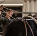 U.S. Marines saddle up during Horsemanship and Animal Packers Course 2-25