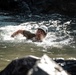 U.S. service members and German soldiers conduct stream crossing exercises during Mountain Medicine 3-25 