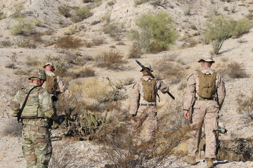 U.S. Soldiers and Marines conduct National Defense Area sign emplacement