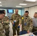 A briefing for Col. Travis Board, 439th AW vice wing commander, and Lt. Col. Joshua Carroll, exercise mission crew commander