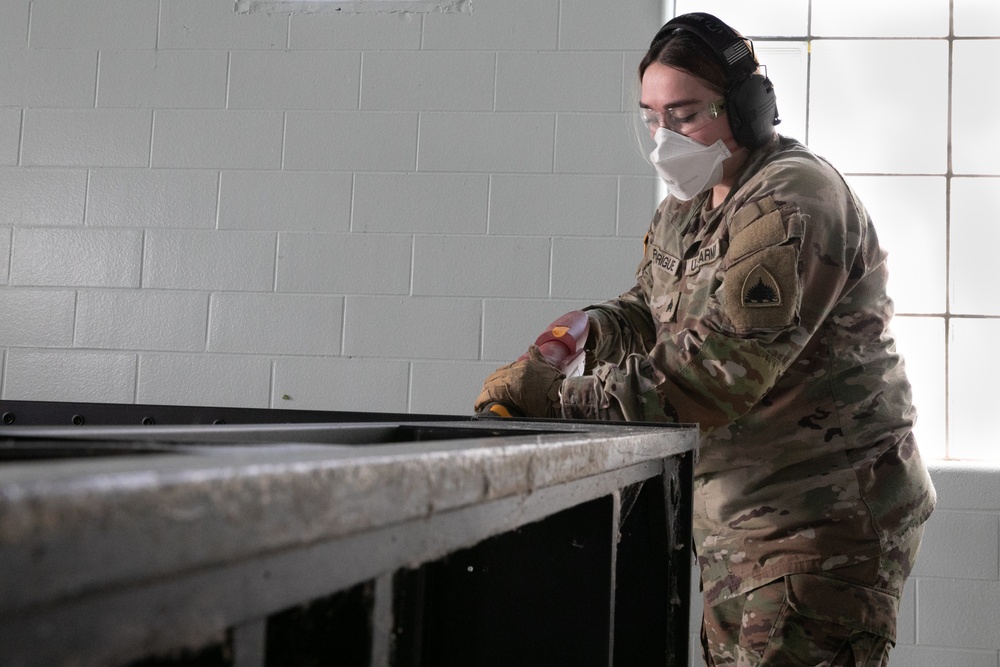 National Guardsmen remove old furniture and build new furniture for Capital Guardian Youth ChalleNGe Academy