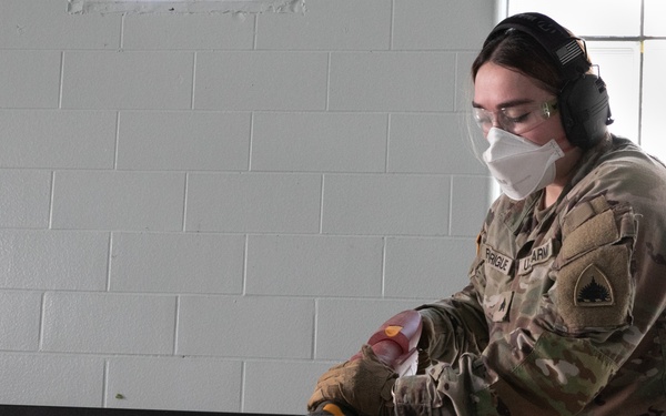 National Guardsmen remove old furniture and build new furniture for Capital Guardian Youth ChalleNGe Academy