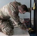 National Guardsmen remove old furniture and build new furniture for Capital Guardian Youth ChalleNGe Academy