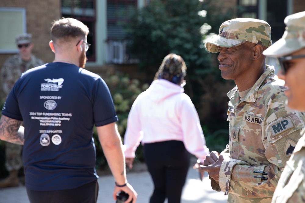 U.S. Service Members with the District of Columbia National Guard Help Volunteers at Special Olympics