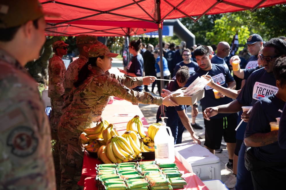 U.S. Service Members with the District of Columbia National Guard Help Volunteers at Special Olympics