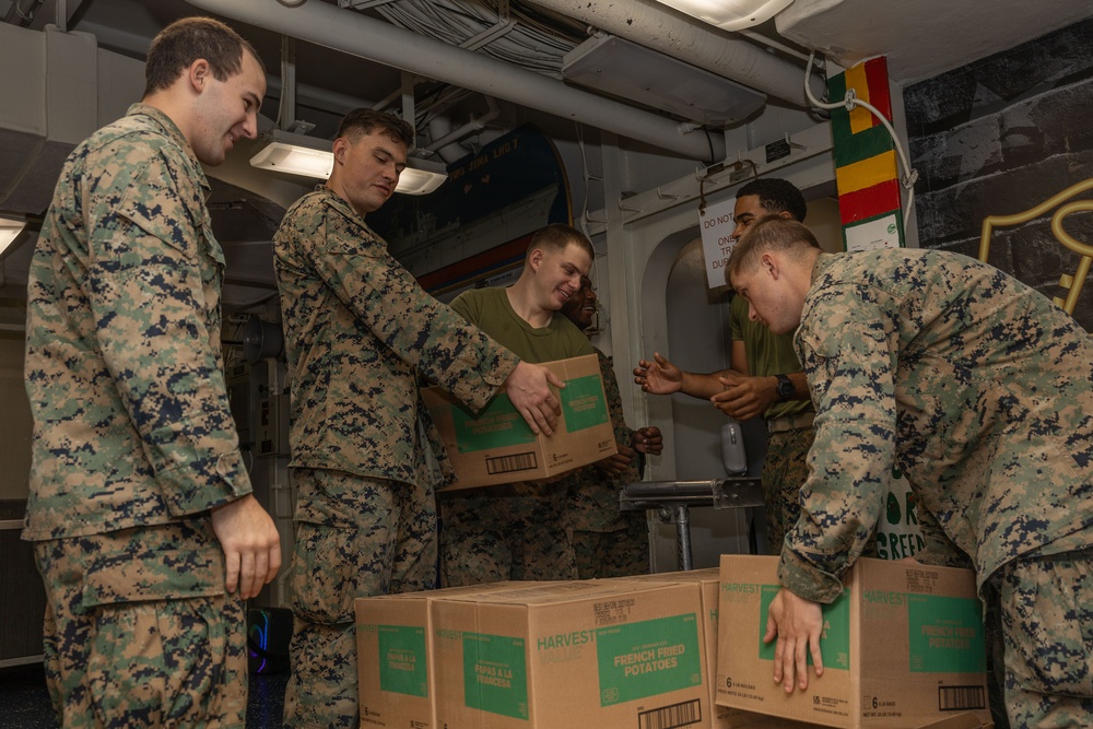 Sailors and Marines Take Part In a Replinshment-At-Sea on Board USS Iwo Jima (LHD 7)