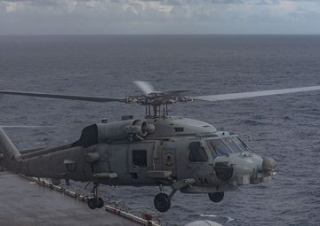 USS Iwo Jima (LHD 7) Conducts Flight Operations in the Rain