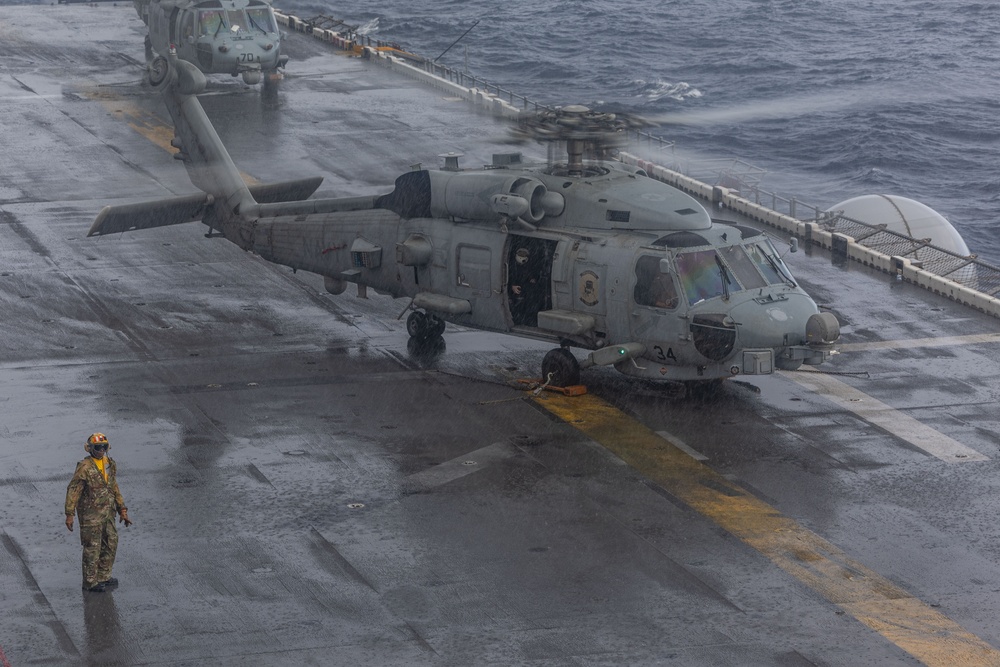 USS Iwo Jima (LHD 7) Conducts Flight Operations in the Rain