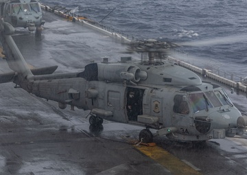 USS Iwo Jima (LHD 7) Conducts Flight Operations in the Rain