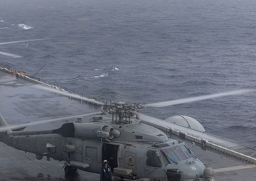 USS Iwo Jima (LHD 7) Conducts Flight Operations in the Rain