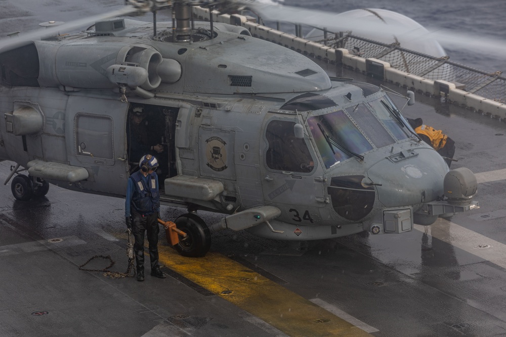 USS Iwo Jima (LHD 7) Conducts Flight Operations in the Rain