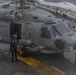 USS Iwo Jima (LHD 7) Conducts Flight Operations in the Rain