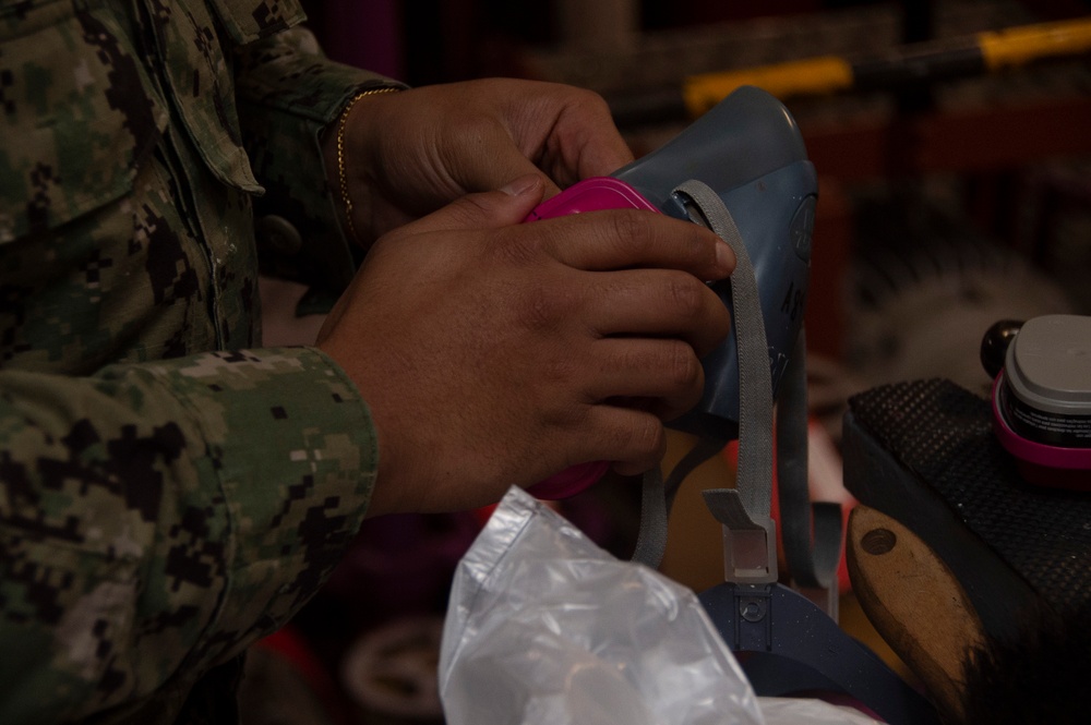 USS Ronald Reagan Sailors Paint Pump Room