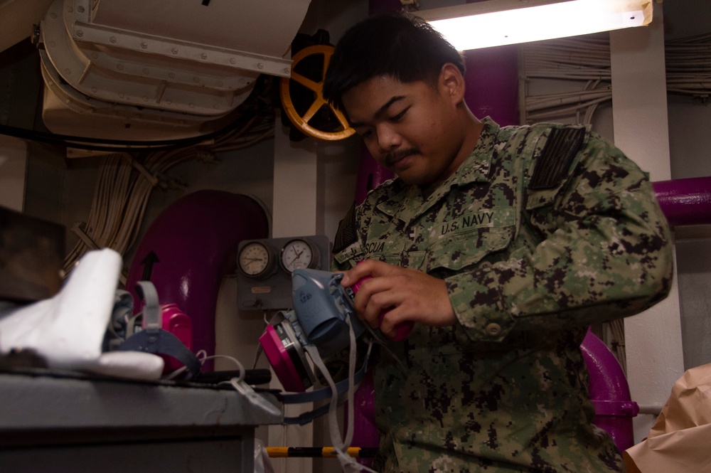 USS Ronald Reagan Sailors Paint Pump Room