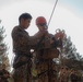 U.S. service members and German soldiers conduct repelling exercises during Mountain Medicine 3-25