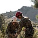 U.S. service members and German soldiers conduct repelling exercises during Mountain Medicine 3-25