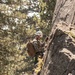 U.S. service members and German soldiers conduct repelling exercises during Mountain Medicine 3-25