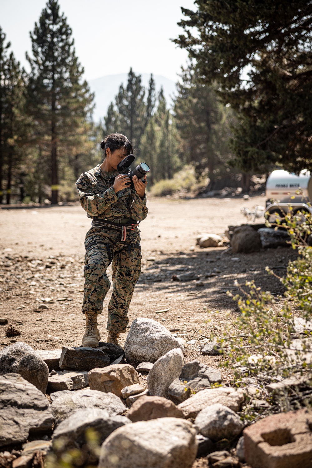 U.S. service members and German soldiers conduct repelling exercises during Mountain Medicine 3-25
