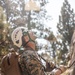 U.S. service members and German soldiers conduct repelling exercises during Mountain Medicine 3-25