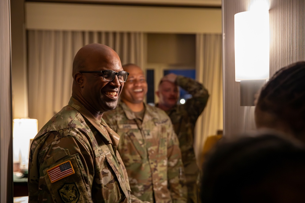 Mississippi National Guard Soldiers give out laundry bags to Troops