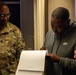 Mississippi National Guard Soldier signs for laundry bags after arriving to Washington, D.C.