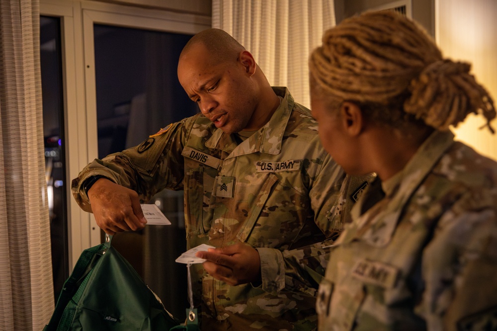 Mississippi National Guard Soldiers verify laundry bags for Troops after arrival to Washington, D.C.
