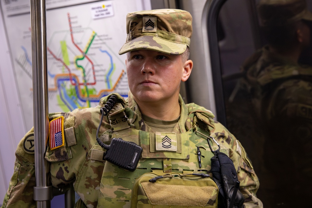 A Mississippi Nation Guard Soldier rides the train while patrolling the Washington Metro