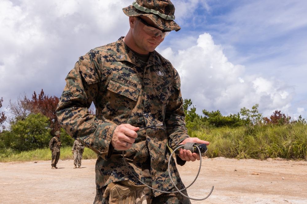 U.S. Marines with 9th Engineer Support Battalion conduct explosive ordinance disposal training for Resolute Dragon 25 