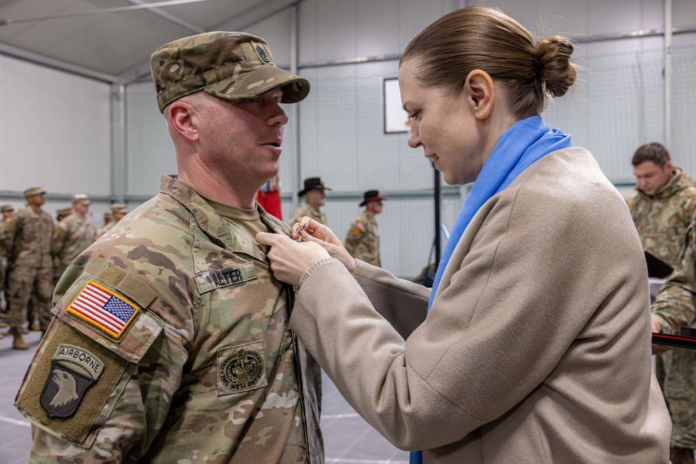 U.S. Army Soldier receives the Medal of the National Defense System of the Republic of Lithuania during a transfer of authority ceremony U.S. Army Soldier receives the Medal of the National Defense System of the Republic of Lithuania during a transfer of authority ceremony