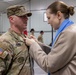 U.S. Army Soldier receives the Medal of the National Defense System of the Republic of Lithuania during a transfer of authority ceremony