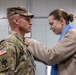 U.S. Army Soldier receives the Medal of the National Defense System of the Republic of Lithuania during a transfer of authority ceremony