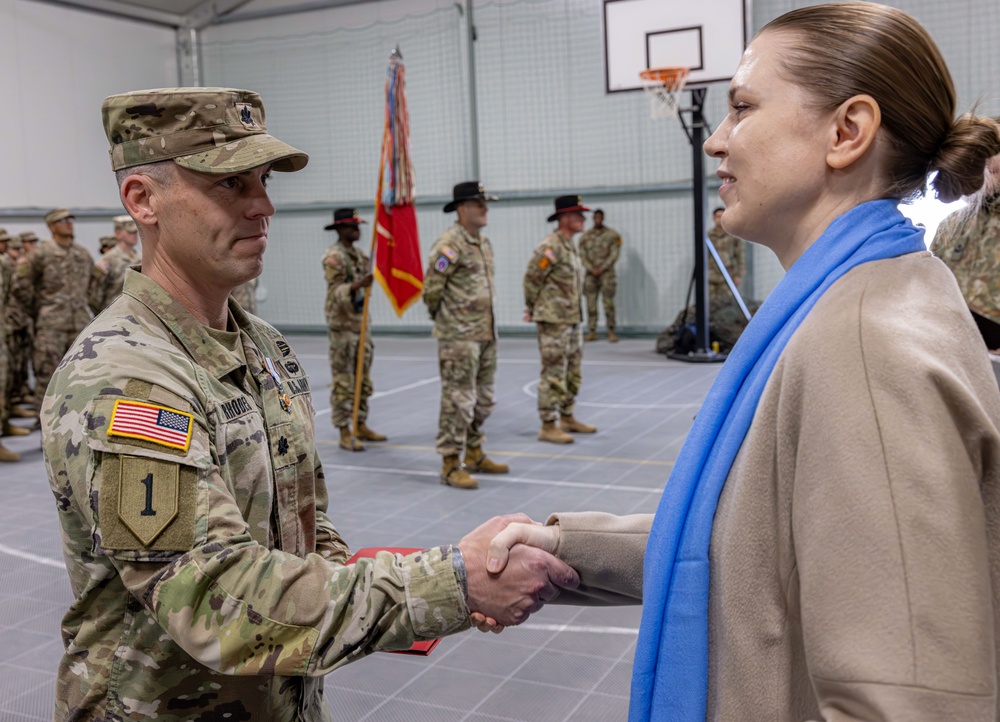 U.S. Army Soldier receives the Medal of the National Defense System of the Republic of Lithuania during a transfer of authority ceremony U.S. Army Soldier receives the Medal of the National Defense System of the Republic of Lithuania during a transfer of authority ceremony